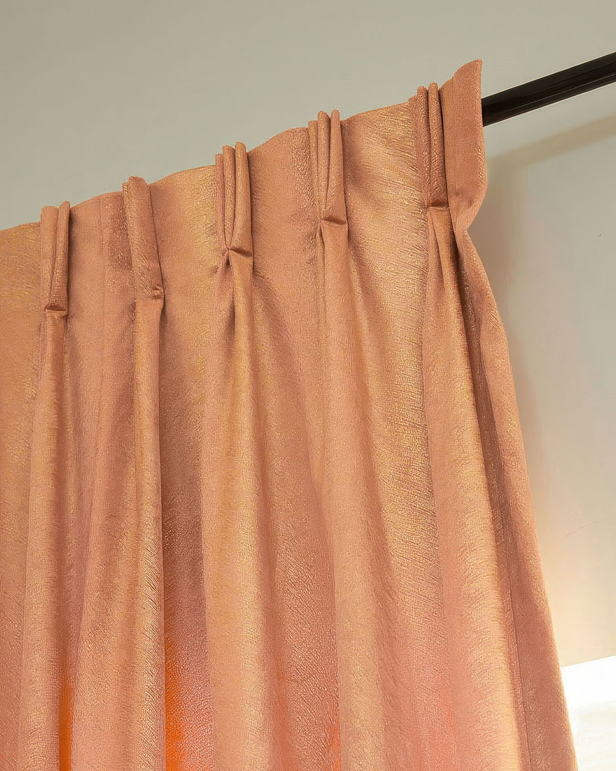 Close-up of luxurious Palma foil printed velvet custom drapery, revealing its elegant patterned texture and rich folds.