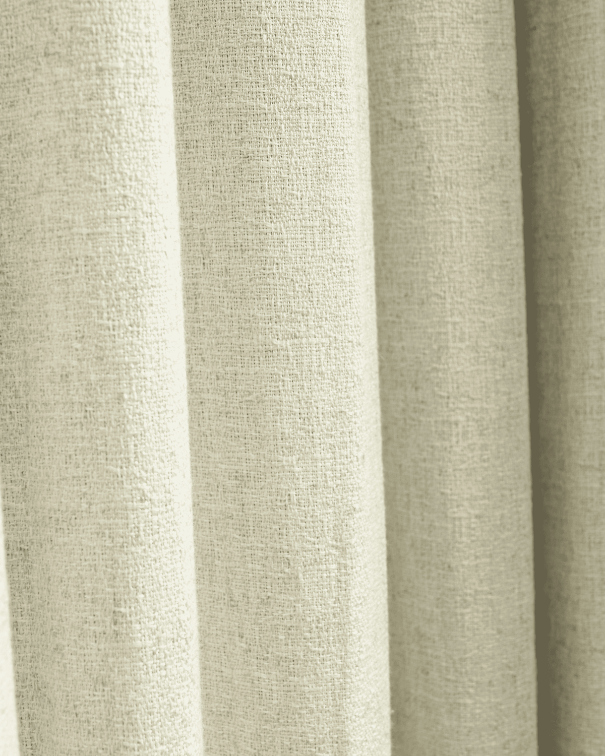 Cream Fiona linen blend custom curtain close-up, revealing its fine fabric texture and elegant folds.