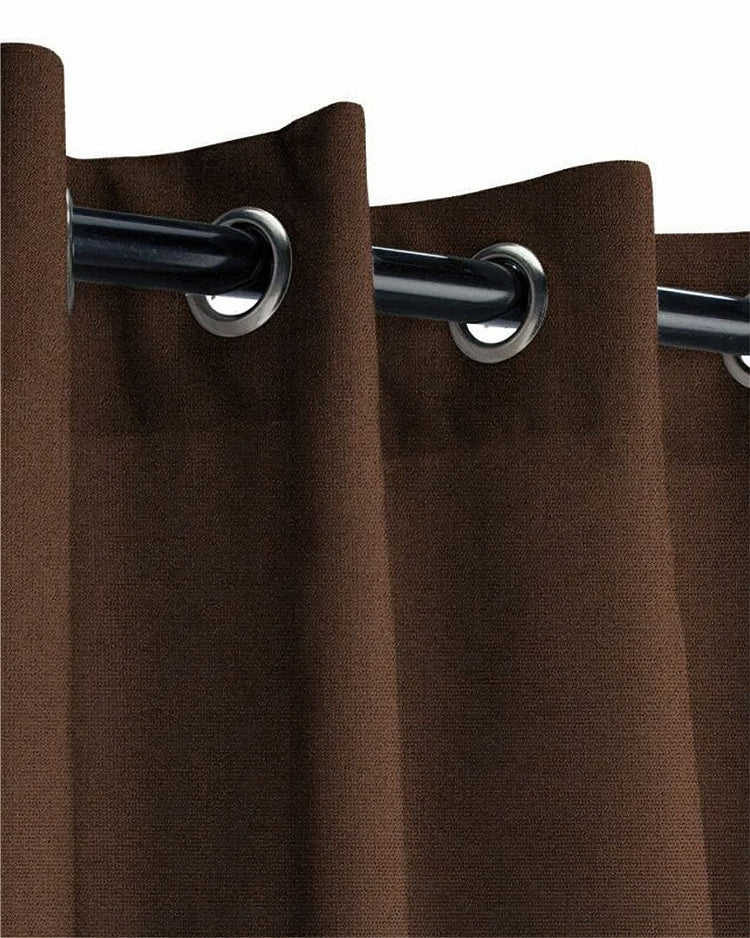 Close-up of dark brown FadeShield Pro blackout outdoor curtain fabric with silver metal grommets.
