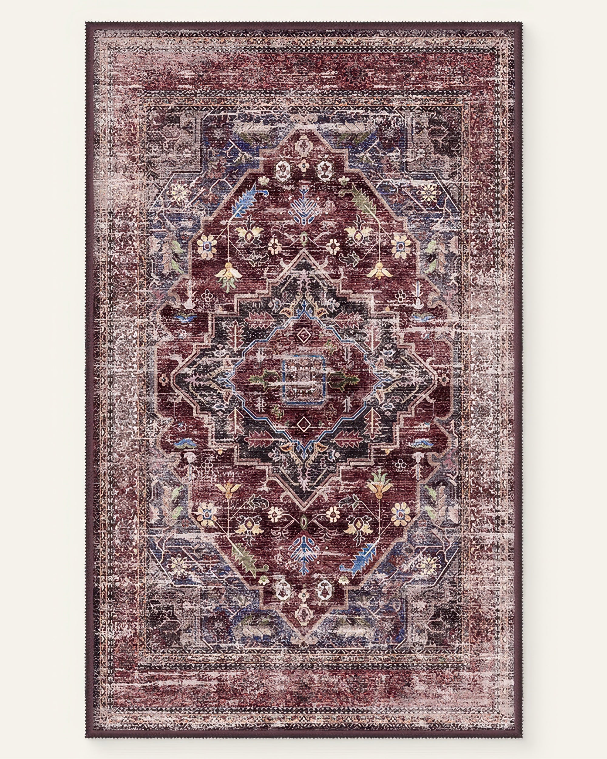 Diana's Garden washable rug: distressed burgundy, blue, gold traditional floral medallion pattern, evoking a fantasy garden.