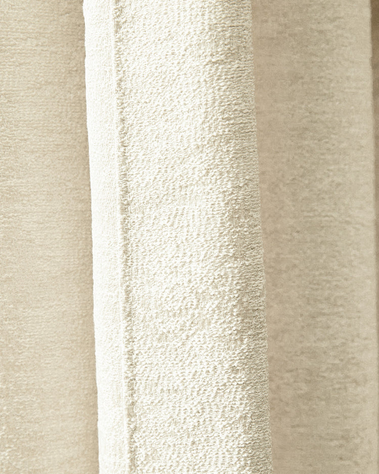 Close-up of the Ambient Jacquard custom curtain fabric, emphasizing its rich, neutral-toned, textured weave for luxurious drapery.