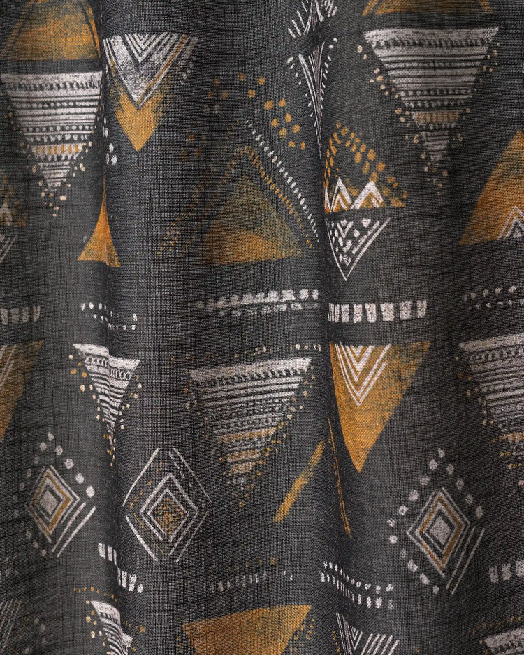 Echo Patterned Sheer Fabric Swatch with dark grey, mustard yellow, and white geometric triangle and diamond designs.