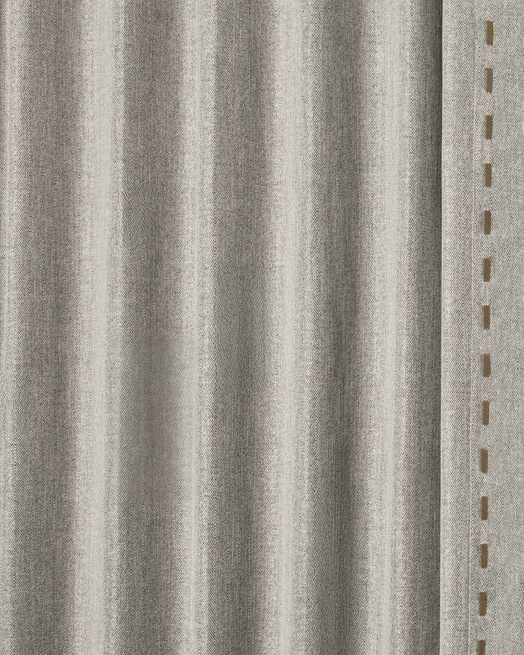 Cleo custom drapery panel: premium neutral herringbone textured fabric with soft folds & elegant vertical trim detail.