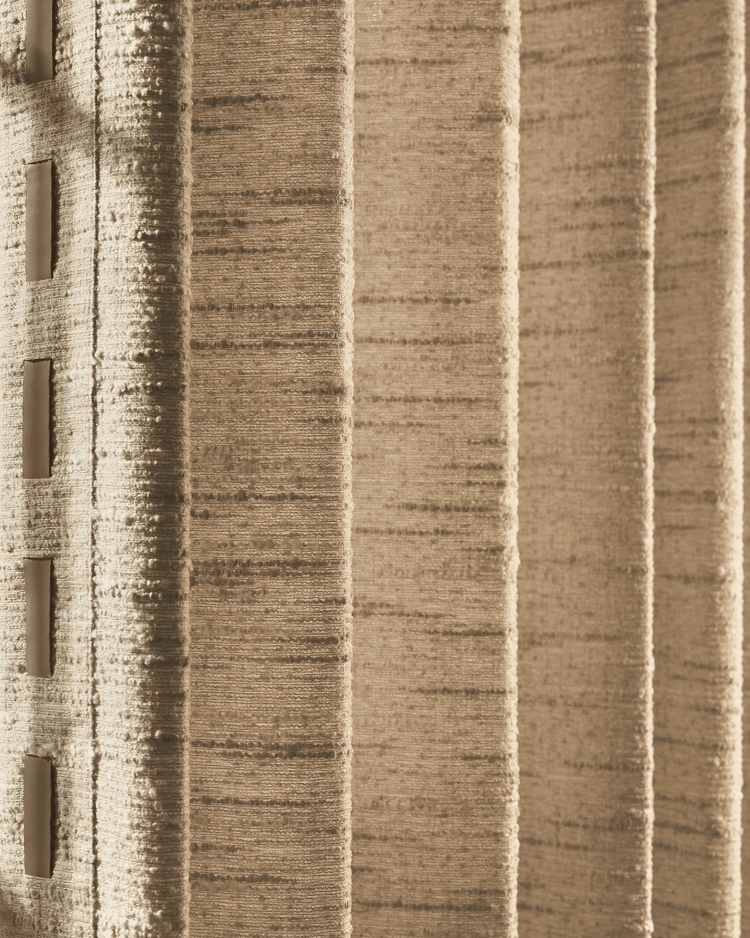 Close-up of Juliette wool blend custom curtain, highlighting its luxurious textured fabric with a thick slubbed weave & elegant trim.