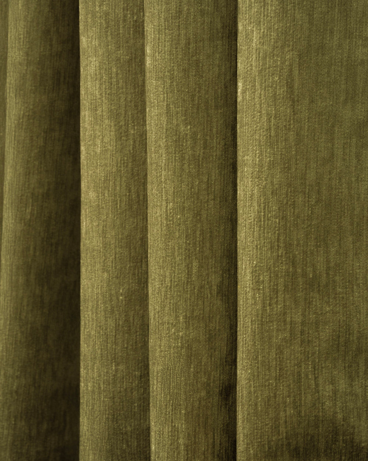 Close-up of olive green Quinn 100% blackout heavyweight velvet custom curtain fabric, showcasing plush texture & elegant folds.