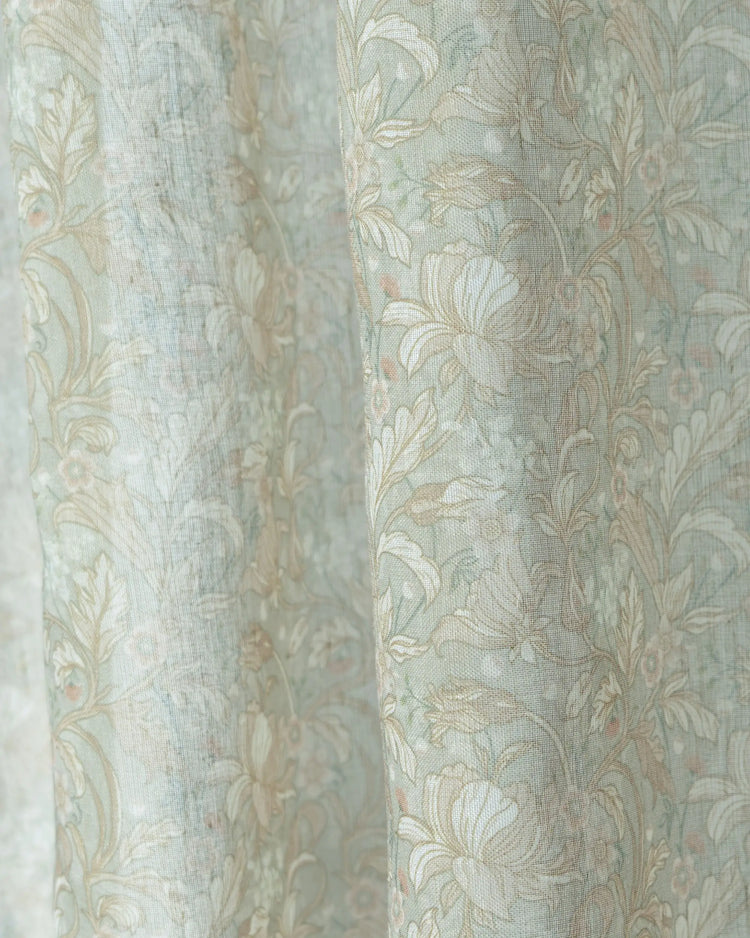 Awake Floral Patterned Sheer fabric swatches in light green and beige with an intricate botanical design for custom drapes.