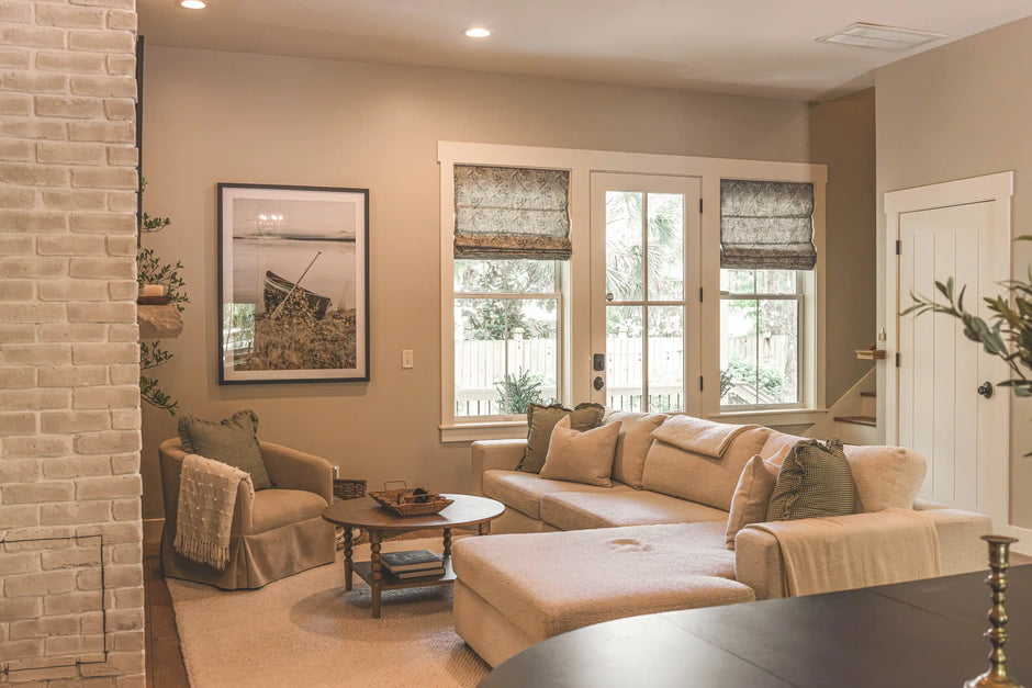 TheHues custom window treatments in a warm neutral living room styled with layered textures