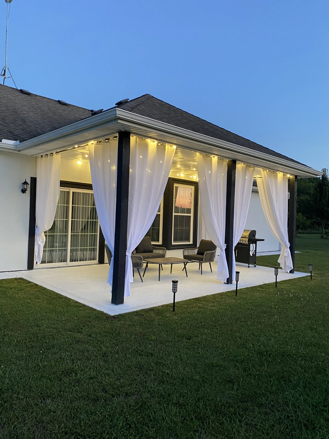 Best outdoor curtain hardware for long spans and high winds