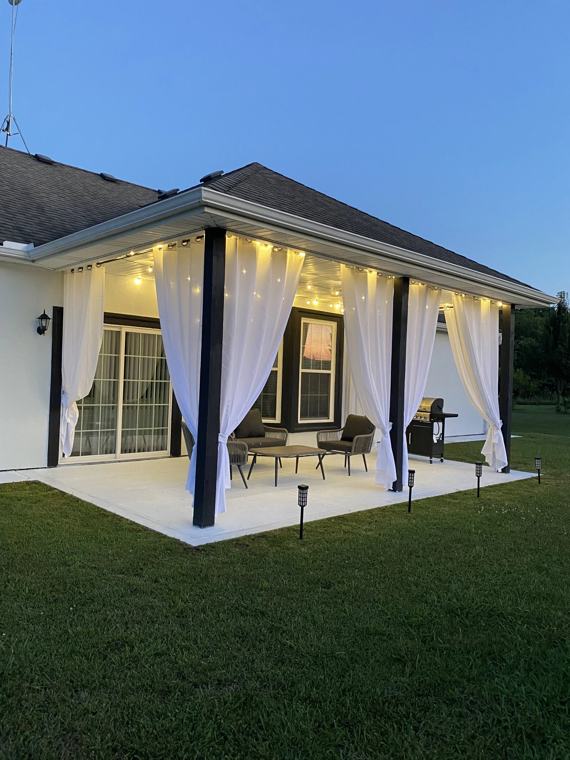 Best outdoor curtain hardware for long spans and high winds