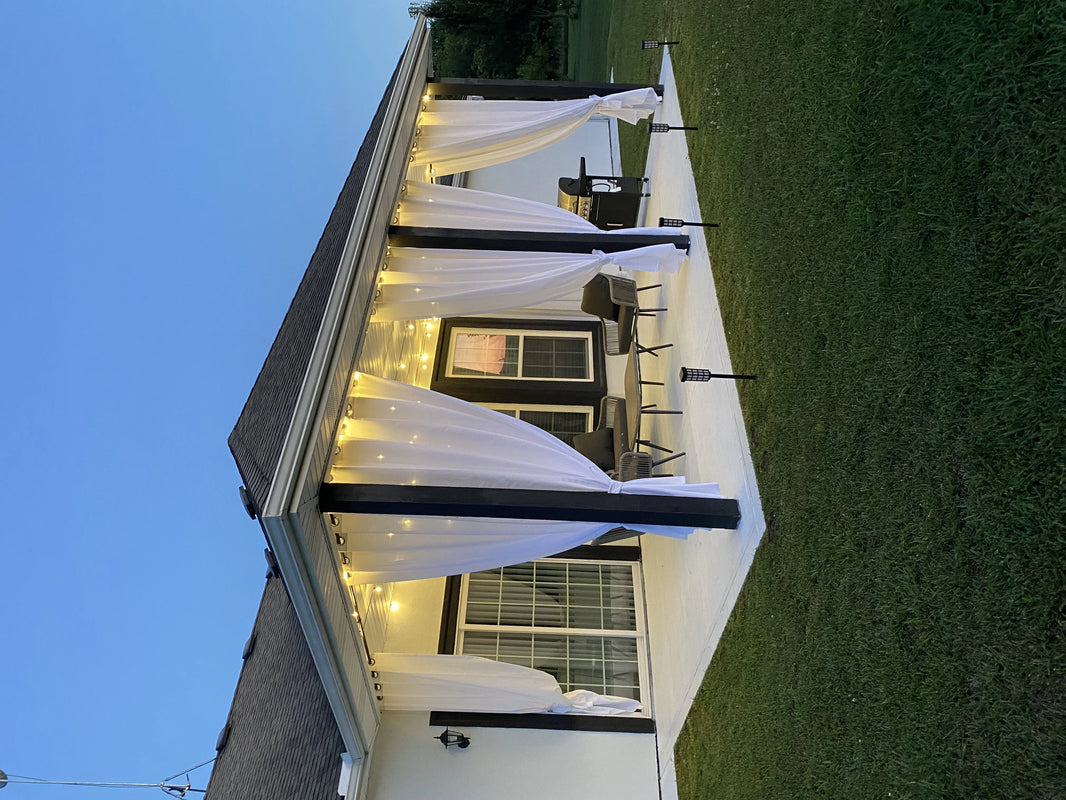 Best outdoor curtain hardware for long spans and high winds