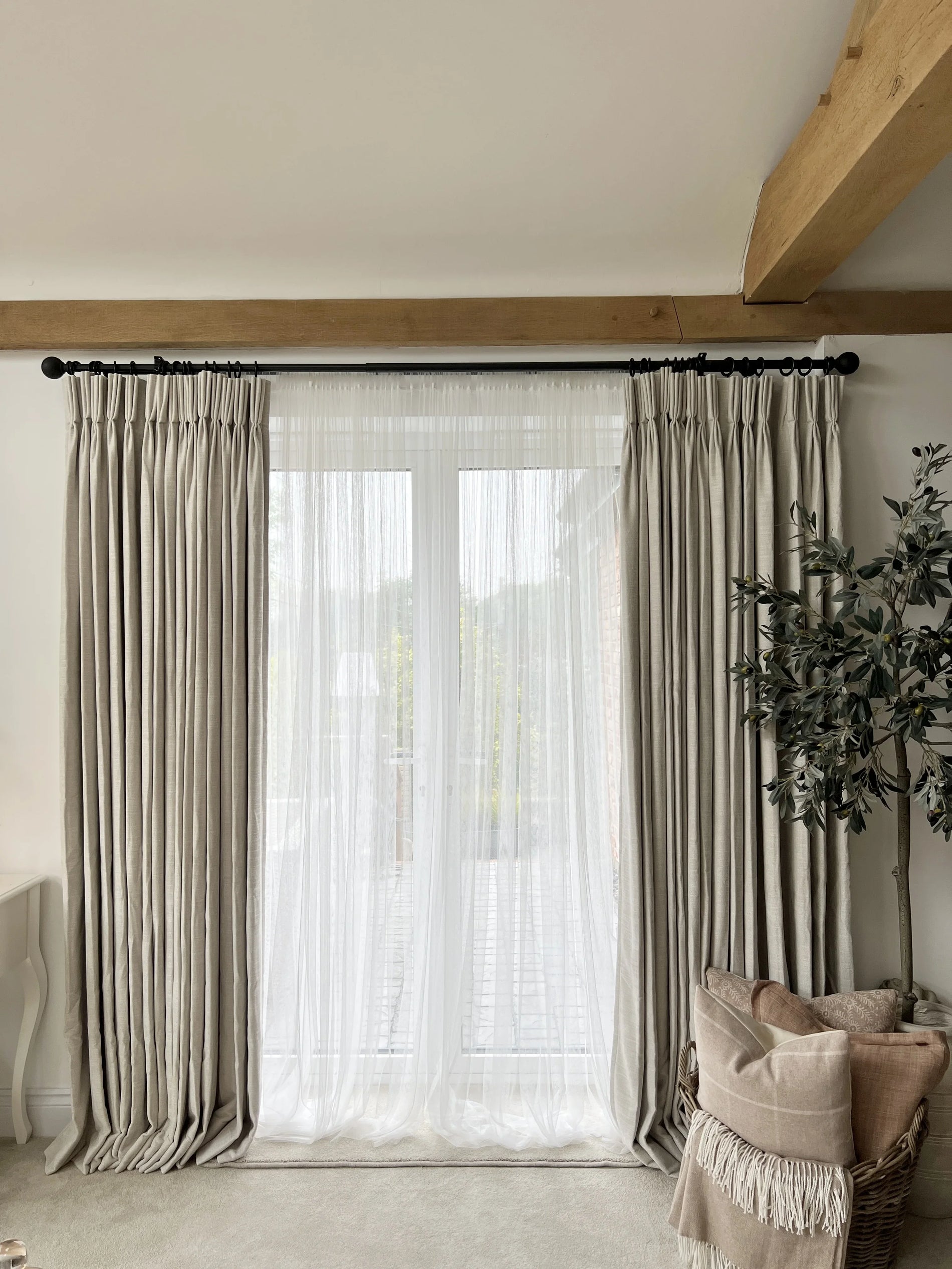 Layering
101: How to Style Sheers + Blackout Curtains for a Luxury Look