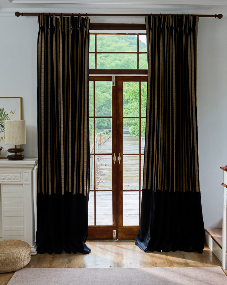 Renee custom color block drapery: gold striped linen on black, deep velvet bottom. Tailored window treatment for sophisticated home aesthetics.