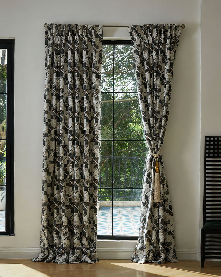 Heavyweight custom linen & wool blend curtain with intricate deconstructed geometric pattern, tied back. Sophisticated home drapery.
