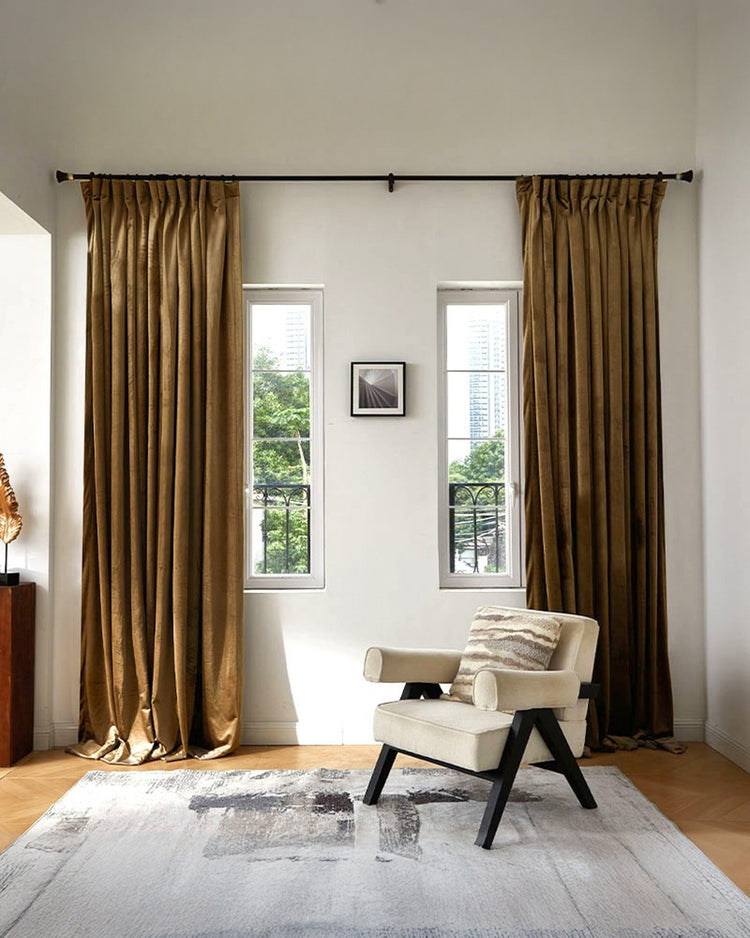 Elegant custom floor-length brown heavyweight velvet curtains for 100% blackout, soundproof & thermal control in a modern living room.
