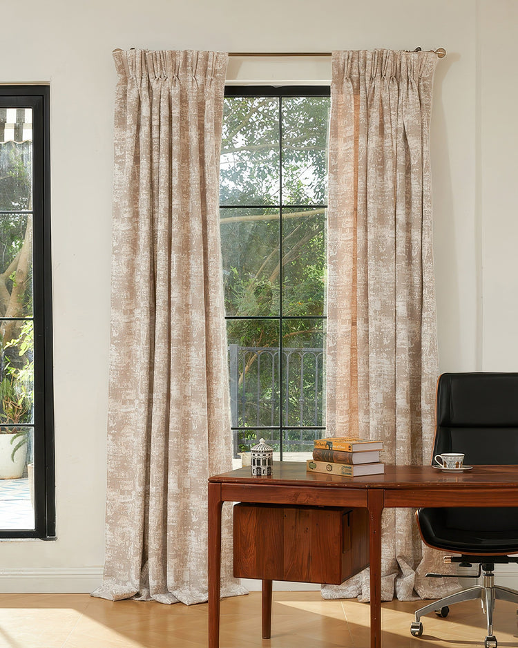 Elegant Mist custom blackout curtains with subtle patterning, providing superior light control and soundproofing for a sophisticated home office.