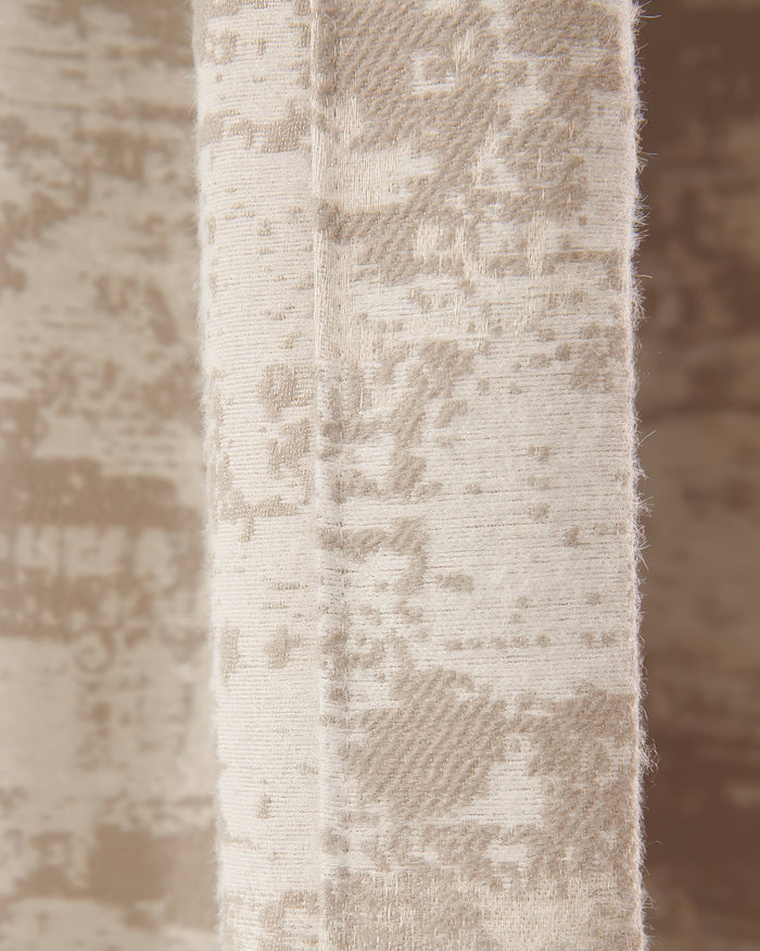 Close-up of Mist Patterned heavyweight custom curtain fabric, showing its textured beige design & premium weave.