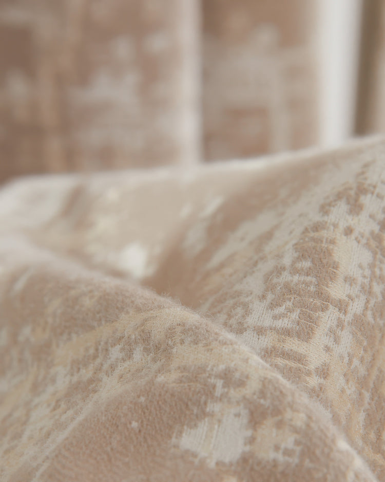 Detail of Mist Patterned heavyweight custom curtain fabric, highlighting its luxurious plush texture and subtle cream-beige pattern.