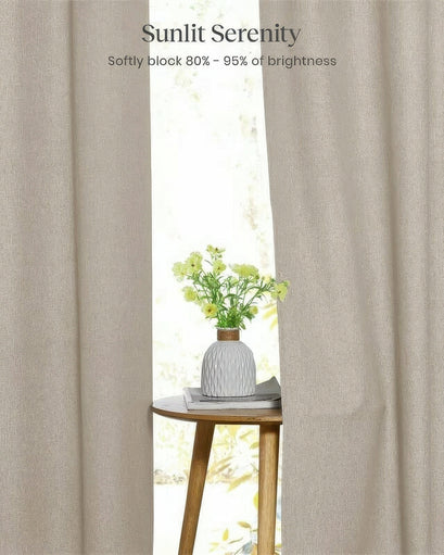 Heavyweight textured Venetian Linen Blend custom curtains in a natural tone, showcasing soft light control with a sunlit window view.
