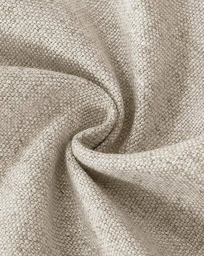 Close-up of natural beige Venetian Linen Blend heavyweight custom curtain fabric, showing its rich textured weave and soft fold.