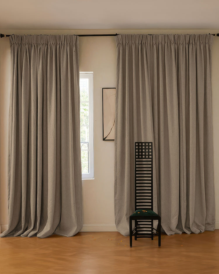Aspen Wool Blend custom drapery in soft textured fabric, light grey, with elegant pleated header, floor-length, enhancing modern home decor.