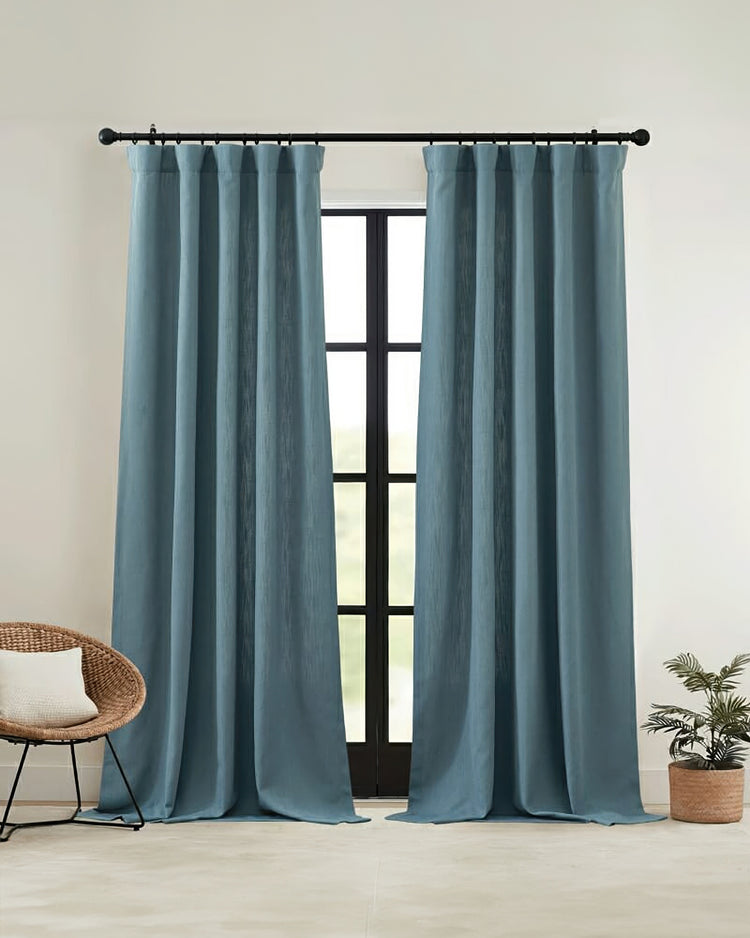 Pair of blue Voy Linen Look custom rod pocket curtains, providing elegant made-to-measure drapery for sophisticated home window treatments.