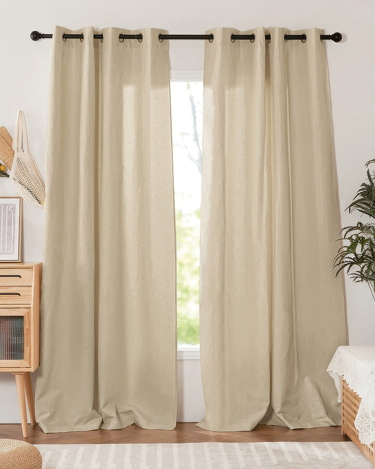 Natural Nara Linen & Cotton Blend custom curtains with grommet header, slightly open on a black rod, revealing a light-filled window.