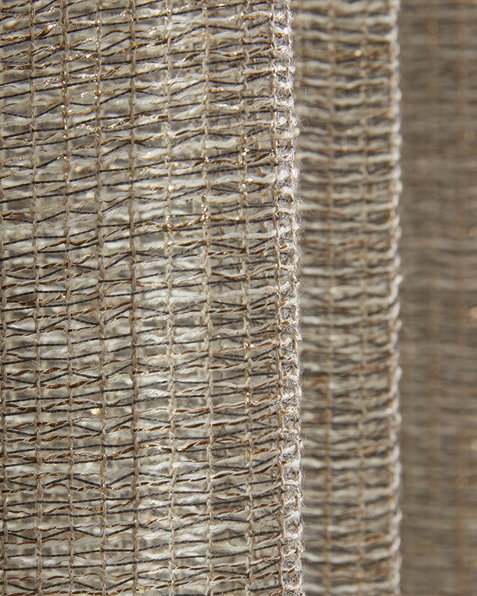 Close-up of Manhattan custom linen blend grid sheer curtain fabric, revealing its textured, intricate grid weave.