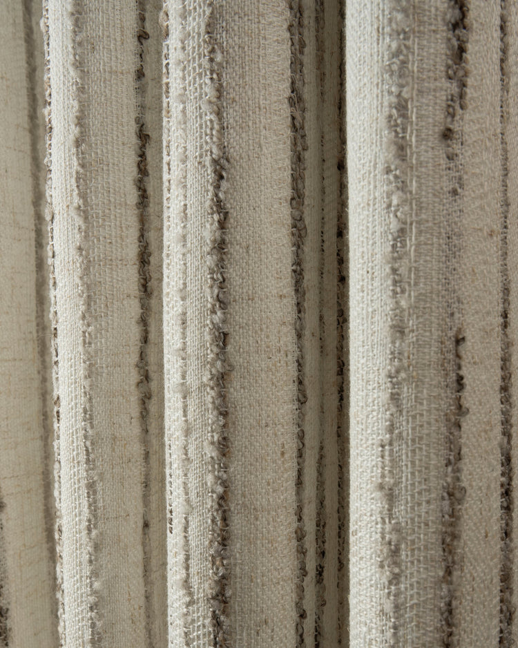 Textured Sahara linen blend patterned fabric, showcasing natural beige weave with raised brown vertical stripes for elegant custom window treatments.