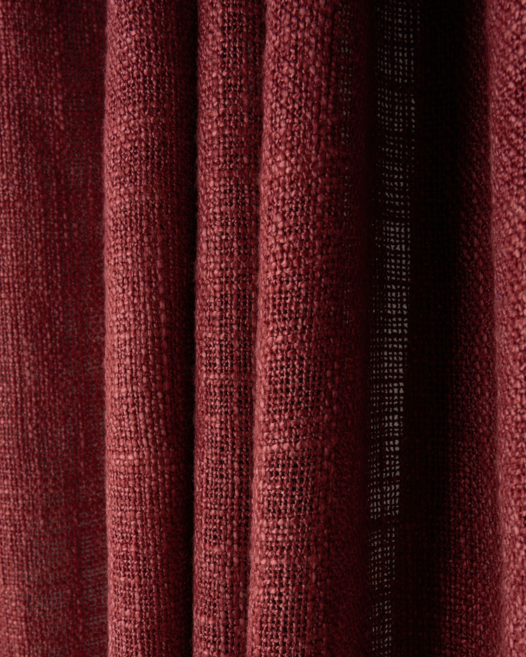 Deep red Jupiter sheer linen fabric swatch showing its textured weave and elegant drape, ideal for custom drapery and light control.