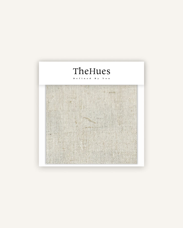 Close-up of a light beige Noah linen look lightweight waterproof fabric swatch, showing its textured weave.