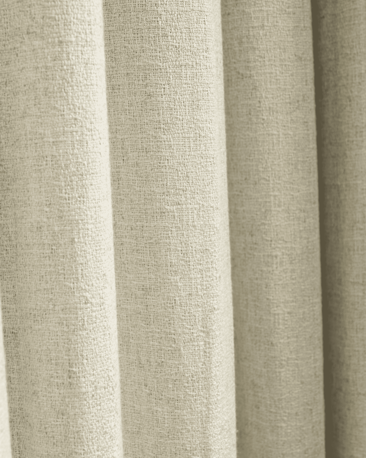 Close-up of Fiona Linen Blend custom curtain fabric, showcasing its textured weave and soft natural beige color.