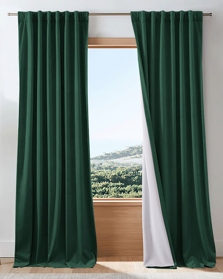 Heavyweight 4-layer dark green velvet custom blackout curtains with white thermal & soundproof lining.