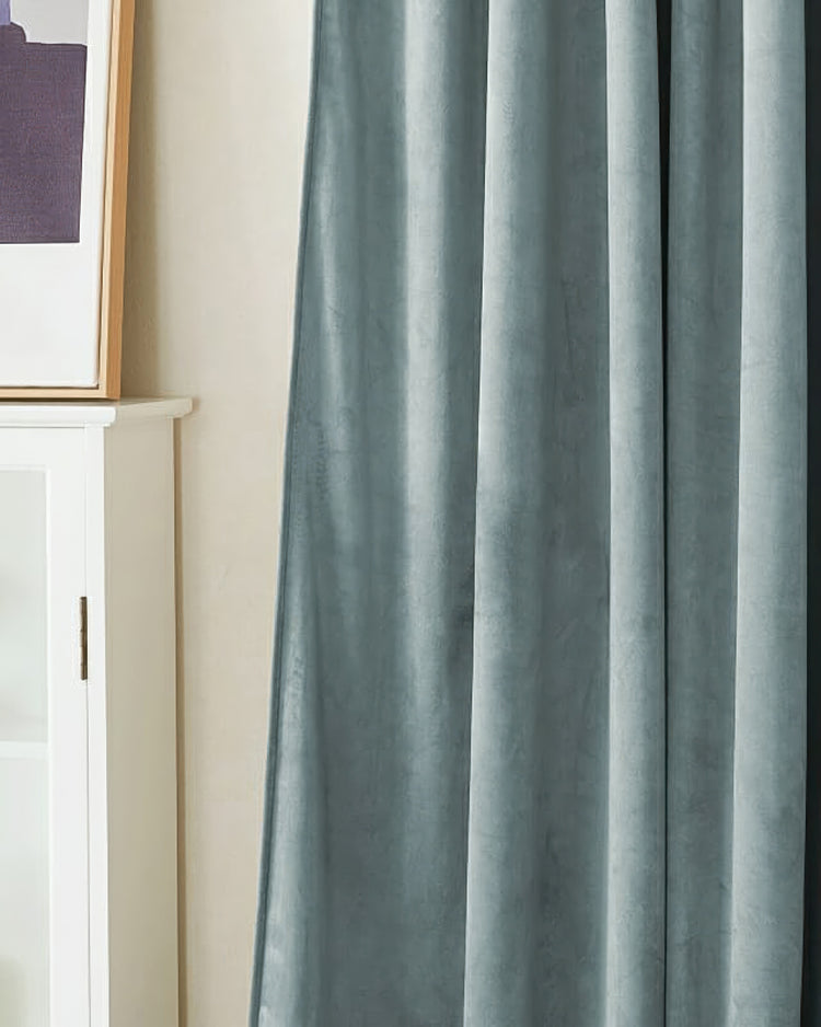 Soft teal velvet custom blackout curtain, heavyweight with thermal & soundproof properties, for elegant home decor.