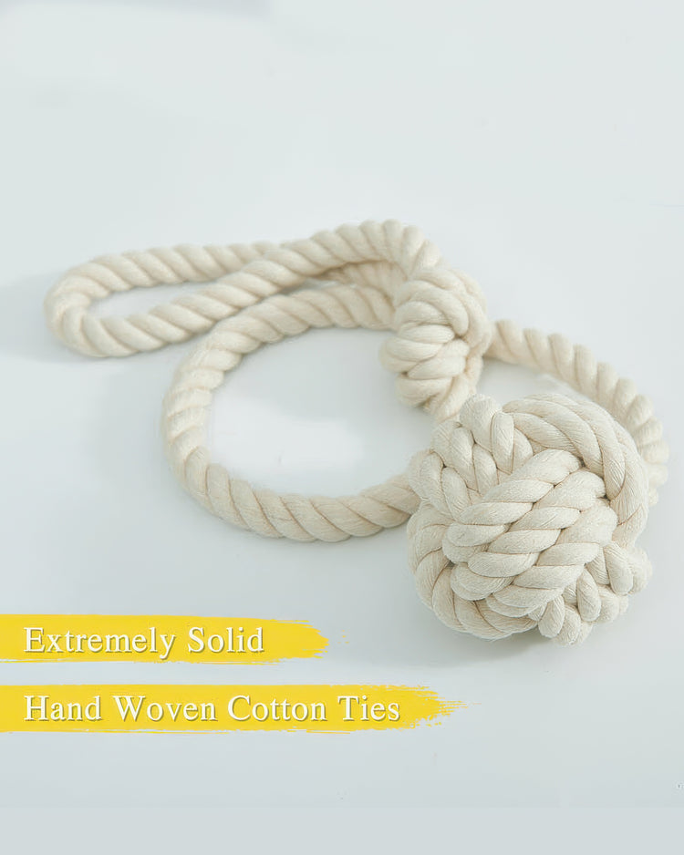 Cream hand-woven cotton rope curtain tieback, featuring a solid decorative ball knot for custom drapery and window treatments.