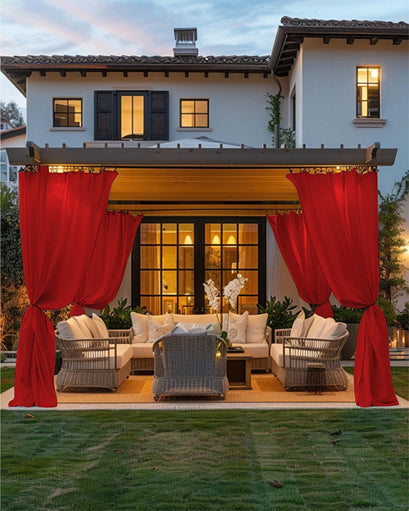Vibrant red FadeShield Pro fade-resistant outdoor curtains tied back on a pergola, creating an elegant patio living space.