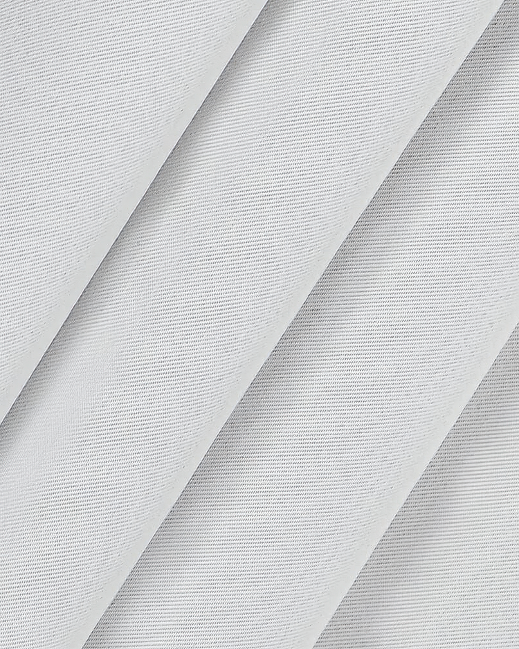 Close-up of white outdoor curtain fabric showcasing its dense, tightly woven texture and subtle pattern, ideal for blackout and water resistance.