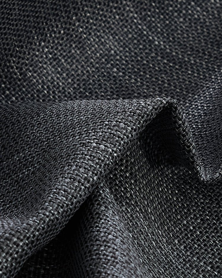 Close-up of dark grey custom outdoor curtain fabric, showcasing its tight, durable fade-resistant and waterproof weave with a subtle texture.