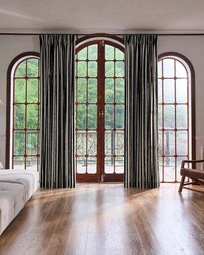Liam Striped Linen Blend Custom Curtains framing arched windows & patio doors for sophisticated privacy & light control.