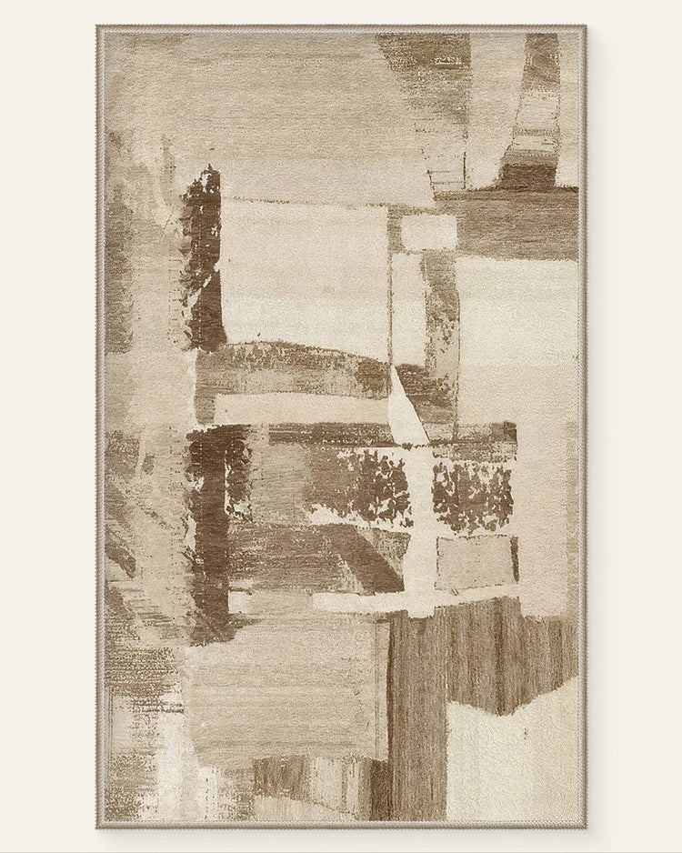 Abstract geometric Tara area rug in neutral beige and brown tones with a vintage printed design. Washable for easy care.