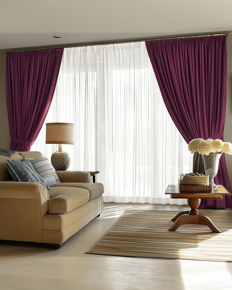 Deep burgundy 100% blackout custom linen curtains tied back, revealing white sheers in a stylish living room. Offers thermal & soundproof.