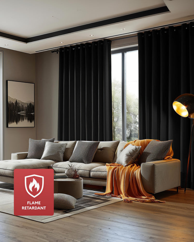 Elegant living room with custom black flame-retardant curtains, providing privacy and light control for modern home aesthetics.