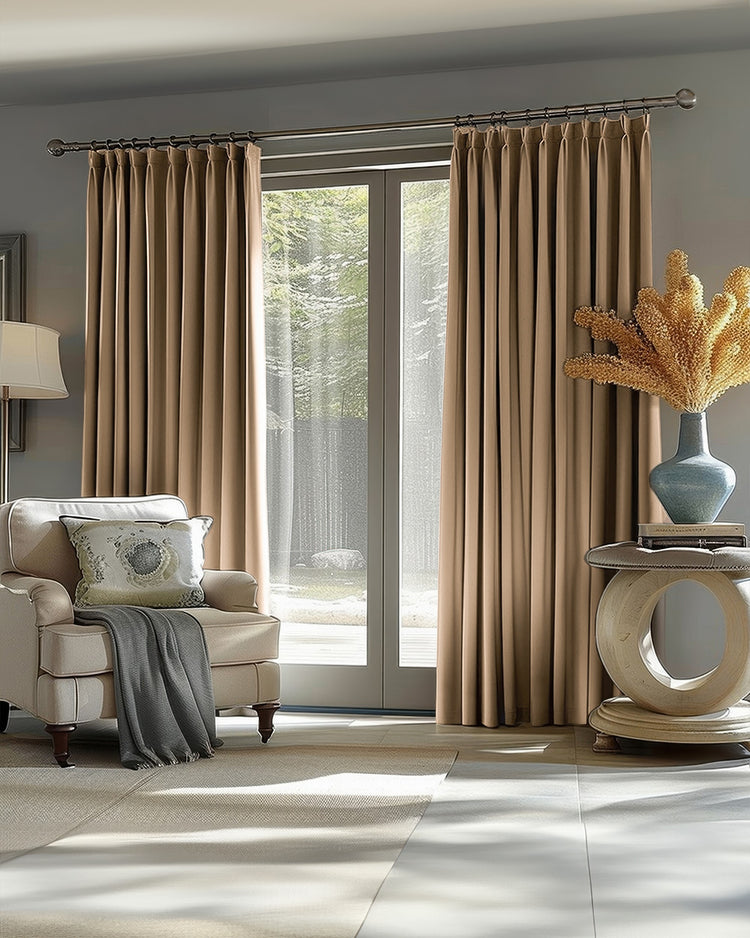 Sophisticated light brown Victoria blackout linen look custom drapery on a large window, enhancing light control & home aesthetics.