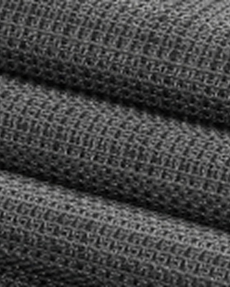 Bohemia dark grey custom outdoor curtain fabric, folded. Close-up of waterproof, crisscross woven texture.