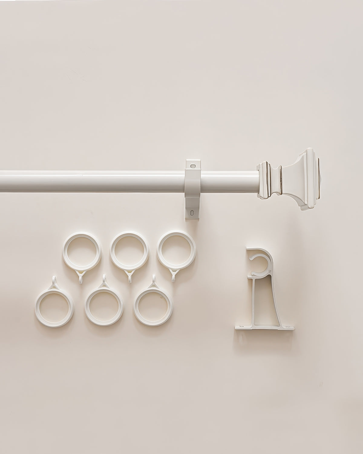 White Roman Square custom finials curtain rod with mounting brackets and six matching curtain rings for tailored window treatments.