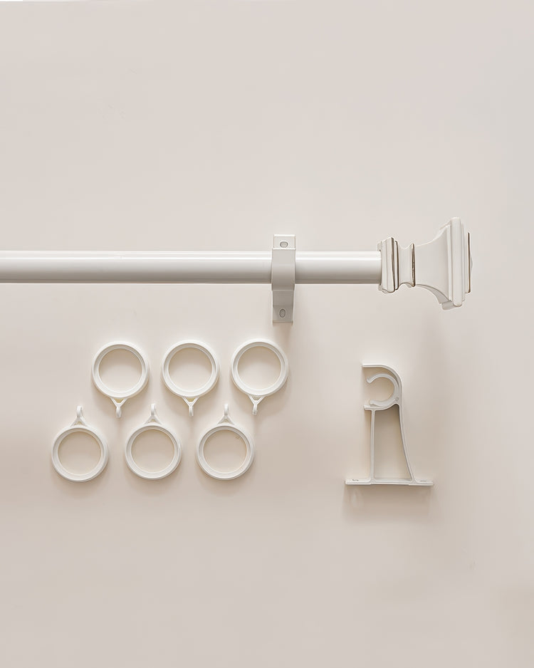 White Roman Square custom finials curtain rod with mounting brackets and six matching curtain rings for tailored window treatments.