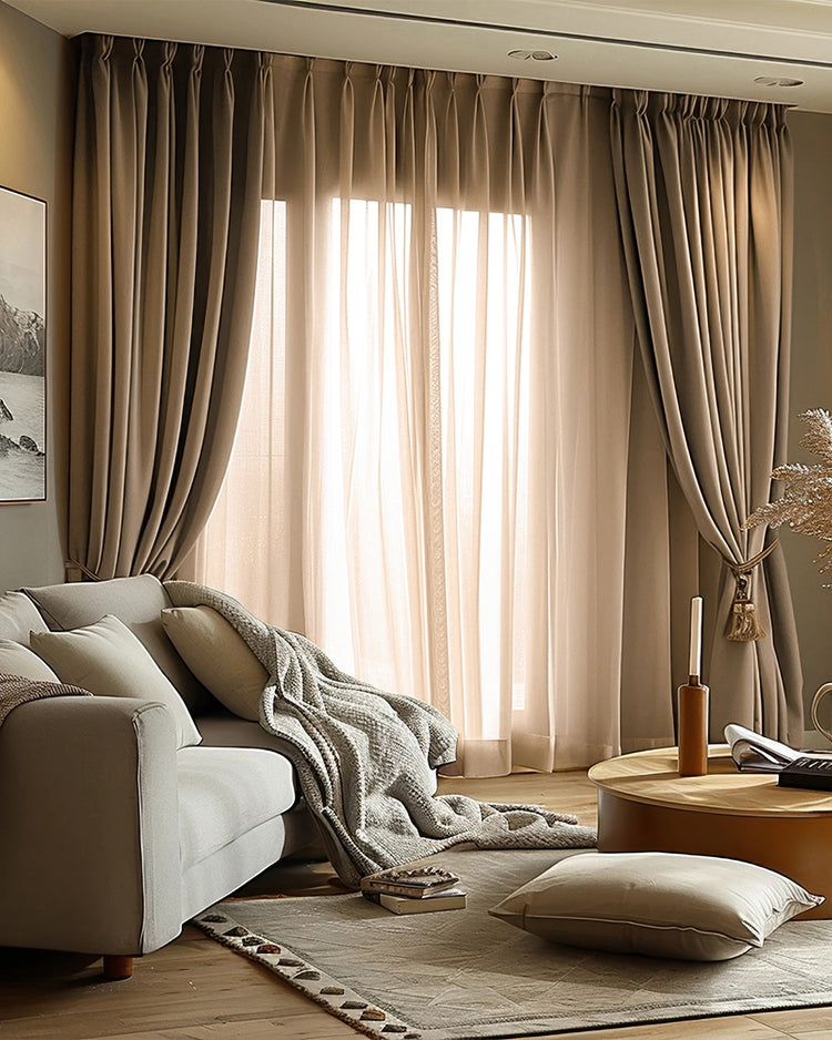 Victoria custom 100% blackout OEKO linen look heavyweight curtains in a living room, pulled back to reveal sheers.