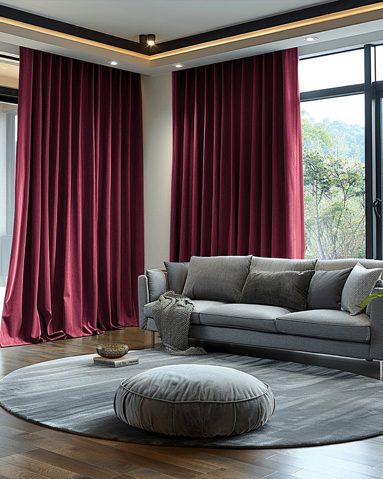 Elegant deep red OEKO heavyweight custom velvet drapery for 100% blackout and privacy in a sophisticated living room.