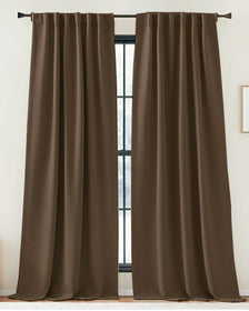 Elegant pair of chocolate brown custom linen look curtains, showcasing soft folds & tailored drapery for sophisticated window treatments.