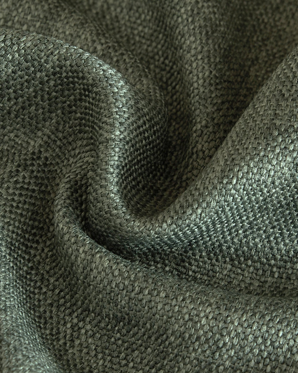 Close-up of the Zoe soft linen look custom curtain fabric, showcasing its rich dark grey weave and elegant drape.