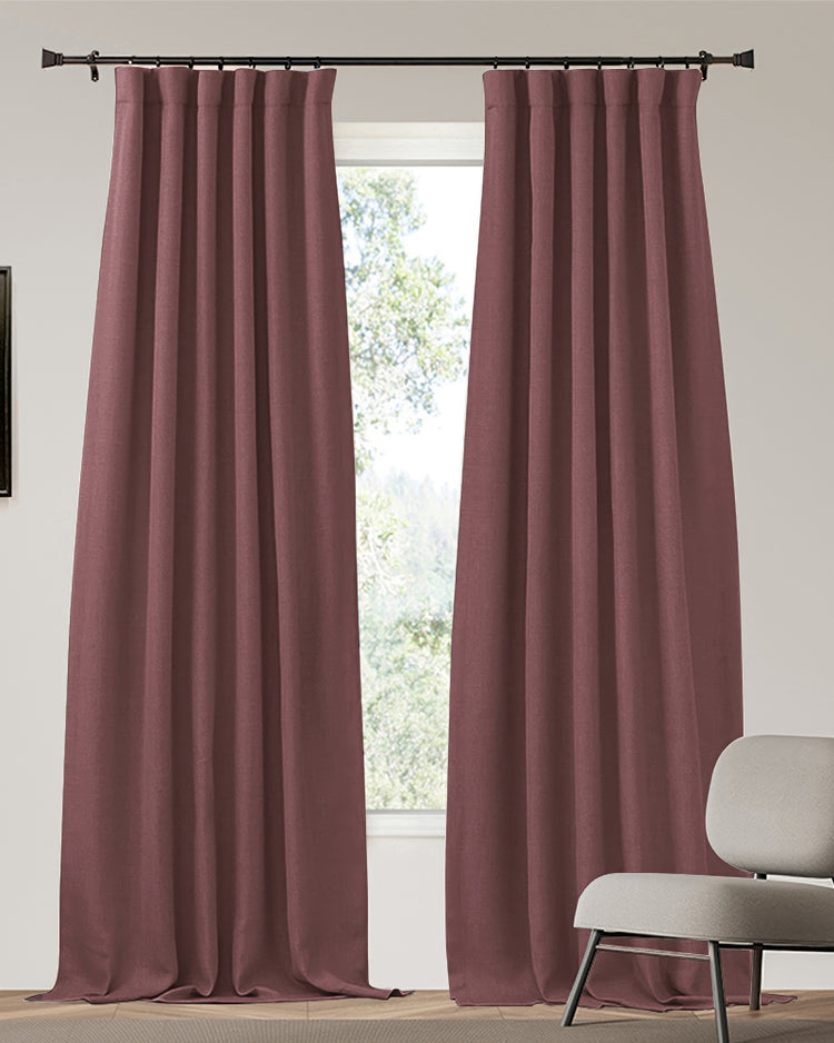 Zoe custom 100% blackout thermal drapery in deep mauve linen look fabric, covering a window for privacy & light control.